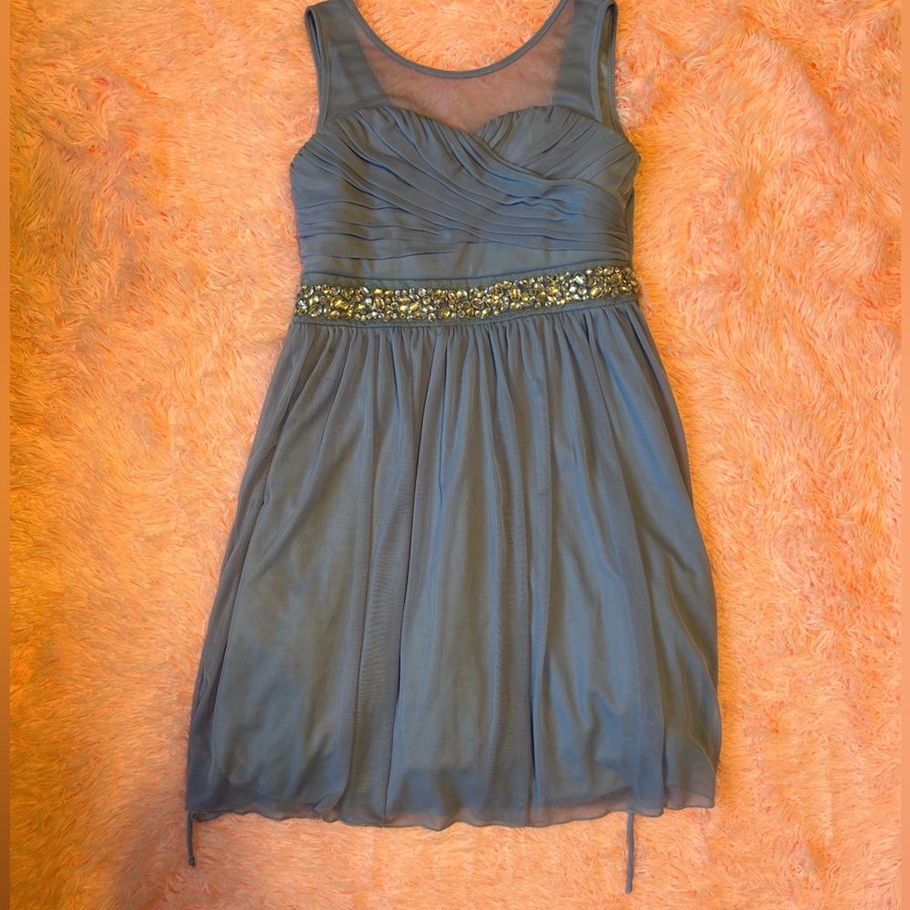 Light blue mini dress with ties and jewel details. Size 12 from Xtraordinary.